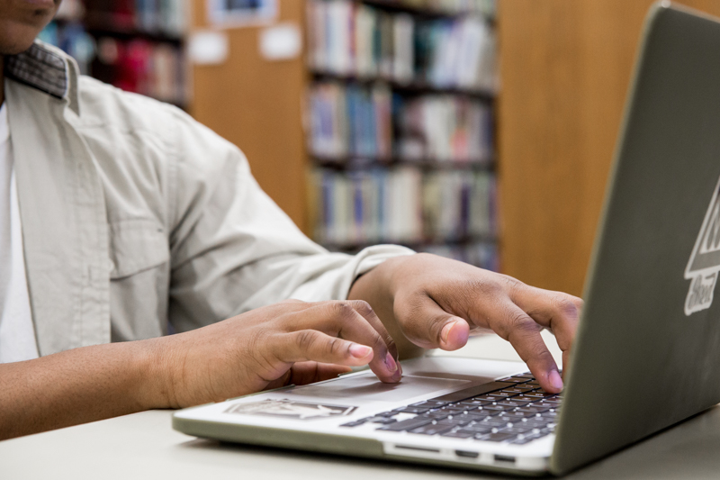 student working on laptop