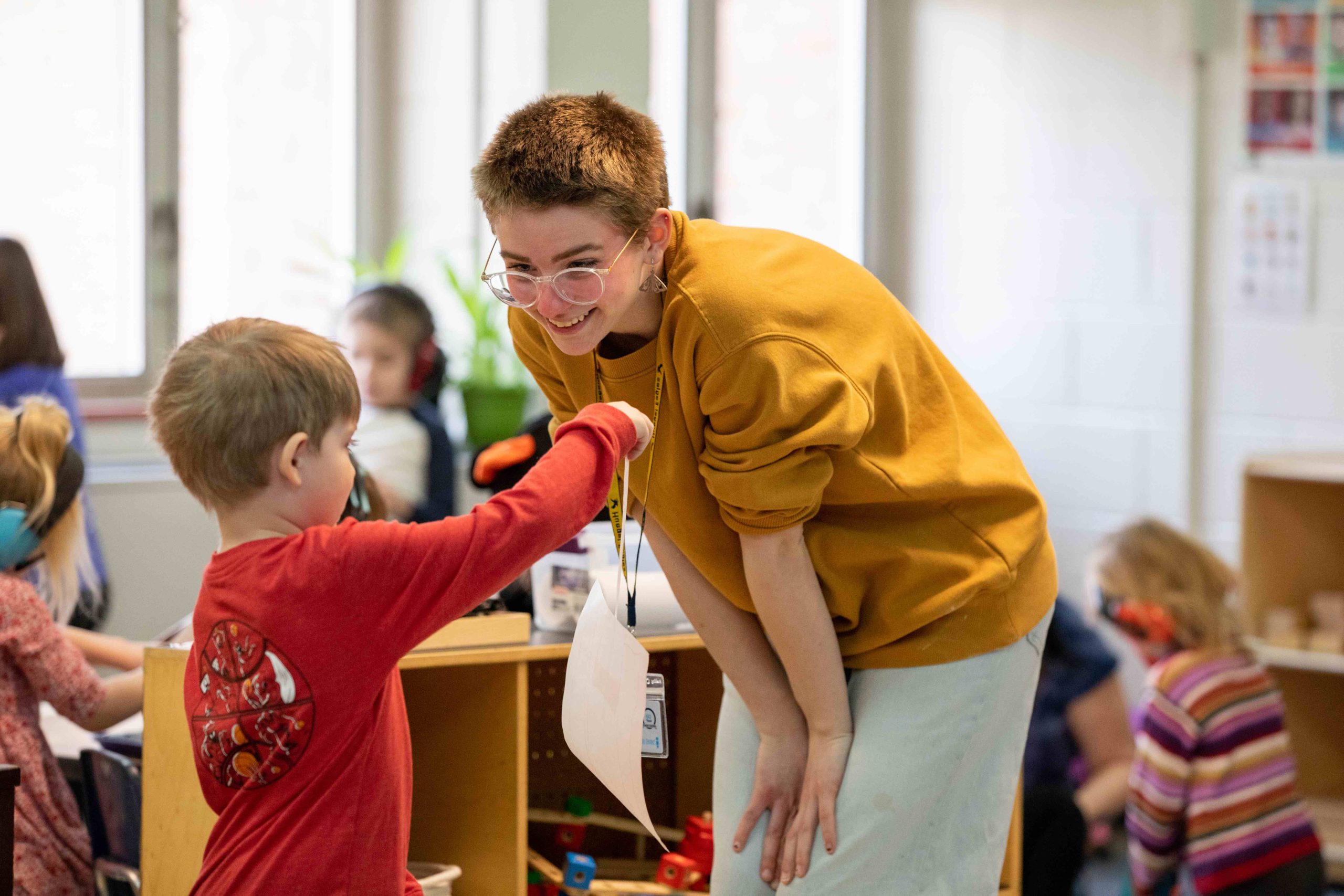 Teacher with young student